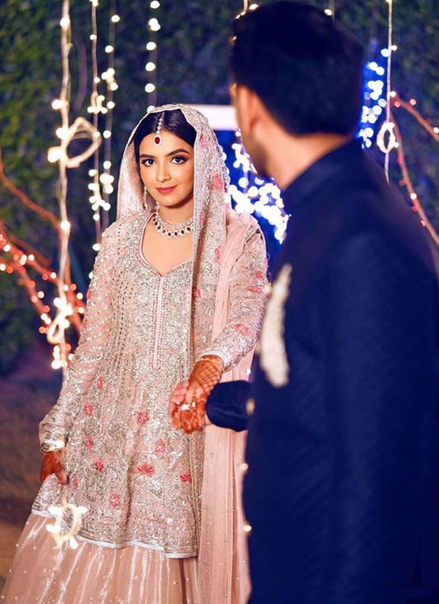 A breathtaking bride on her engagement day in a blush Farah Talib Aziz bridal