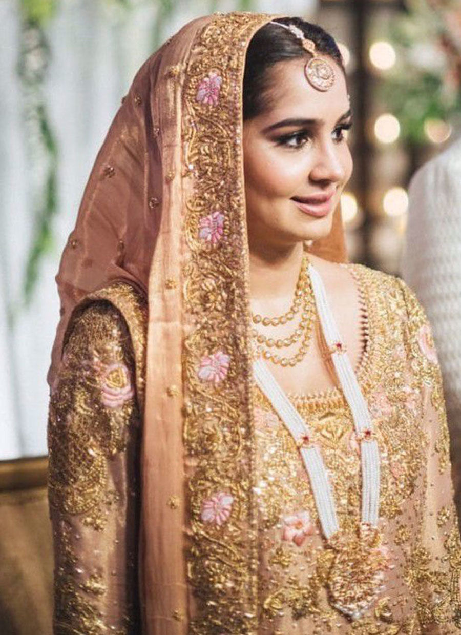 Zahra Khan looking exquisite at her wedding in a traditional #Farah Talib Aziz ensemble