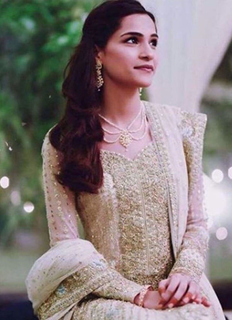 Neha Patel, absolutely gorgeous on her Nikkah in a custom made Farah Talib Aziz kalidaar peshwas in Ivory featuring gold embellishments