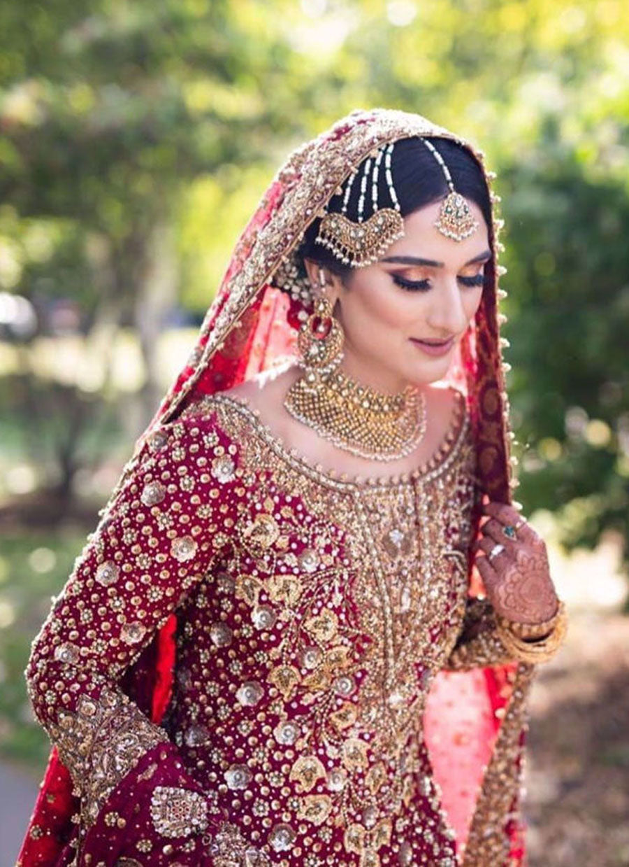 Saliha Ayub In a Stunning Scarlet Ensemble Accentuated with Intricate Zardozi