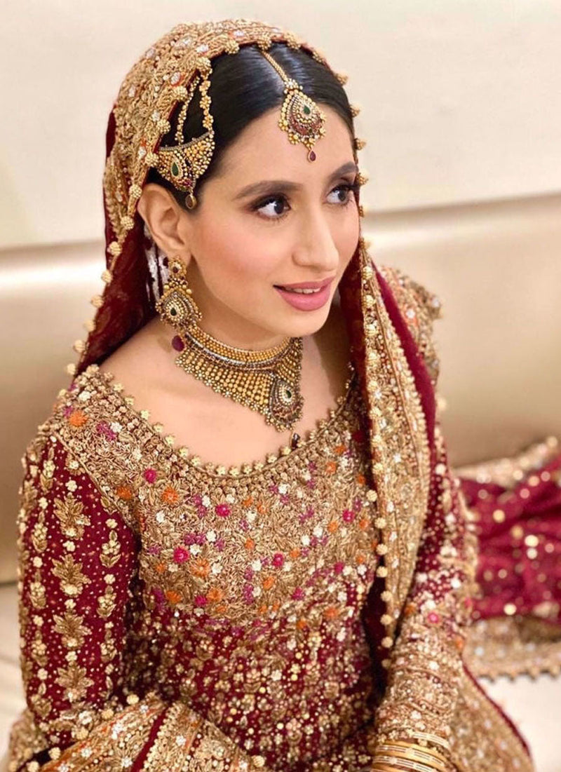 Sana Humayun Wears a Traditional Ensemble in Scarlet Red Heirloom Bridal